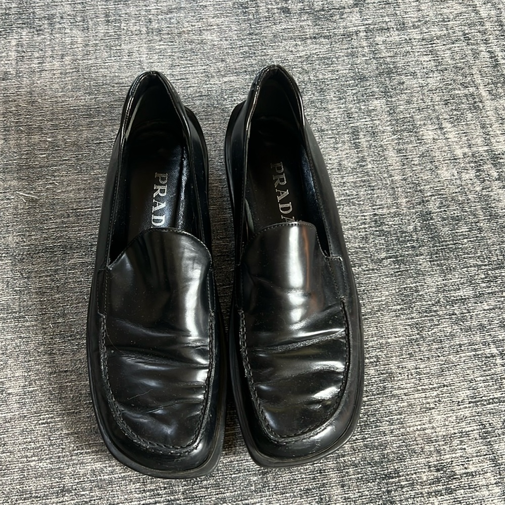 Women’s black leather Prada loafers. Size 38.5